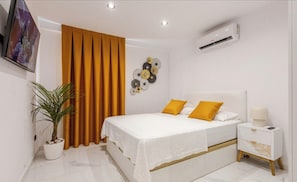 2 عدّة غرف نوم وخزنة داخل الغرفة ومكواة/لوح كي وواي فاي