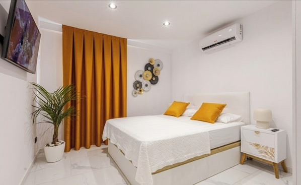 2 bedrooms, in-room safe, iron/ironing board, WiFi