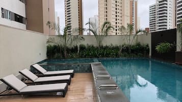 Deluxe Studio, 1 Queen Bed, City View | Pool | Outdoor pool, open 8:30 AM to 10:00 PM, free pool cabanas