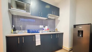 Appartement Confort, 2 grands lits | Cuisine privée | Réfrigérateur grande capacité avec congélateur, four à micro-ondes