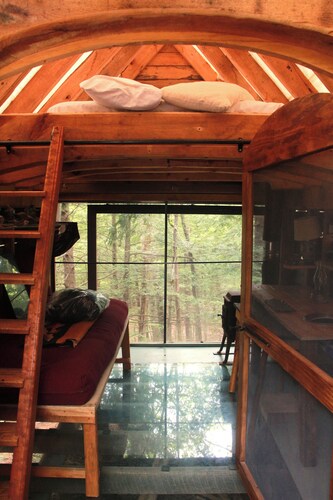 Stone Haven "Tent Cabin" with a cast iron fire pit in Canterbury, NH.