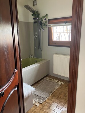 Shower, hair dryer, towels, soap