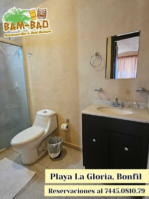 Shower, towels, soap, toilet paper