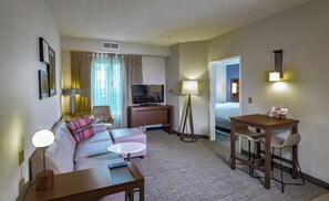 Deluxe Suite, 1 Bedroom, Kitchen | Laptop workspace, blackout drapes, iron/ironing board, free WiFi