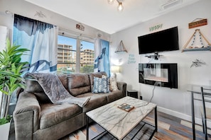 Appartement Junior, 1 grand lit et 1 canapé-lit, patio | Aire de séjour
