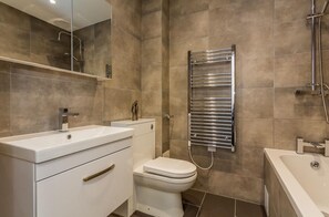 Hair dryer, towels, soap, toilet paper