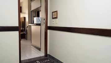 Standard Room, Kitchen, City View | Living area