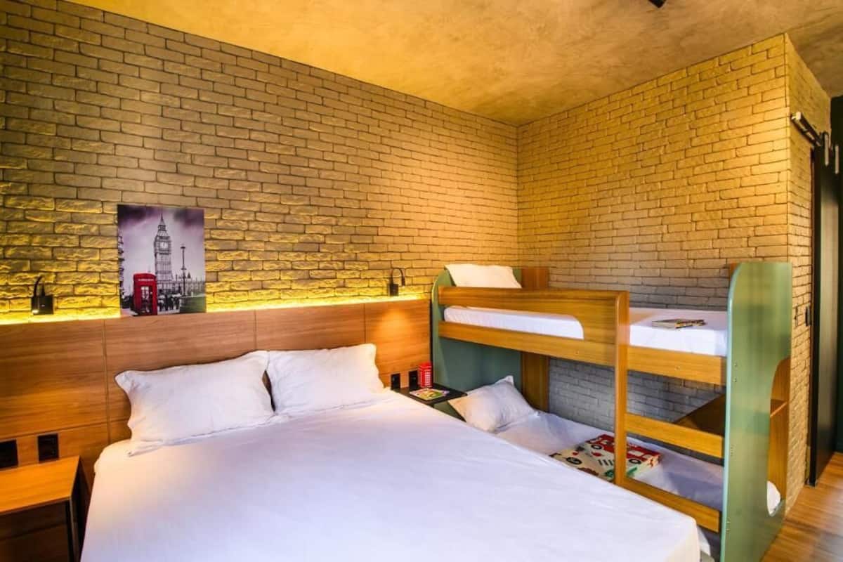 Family Studio Suite, Jetted Tub, City View | Laptop workspace, WiFi (free), bed sheets