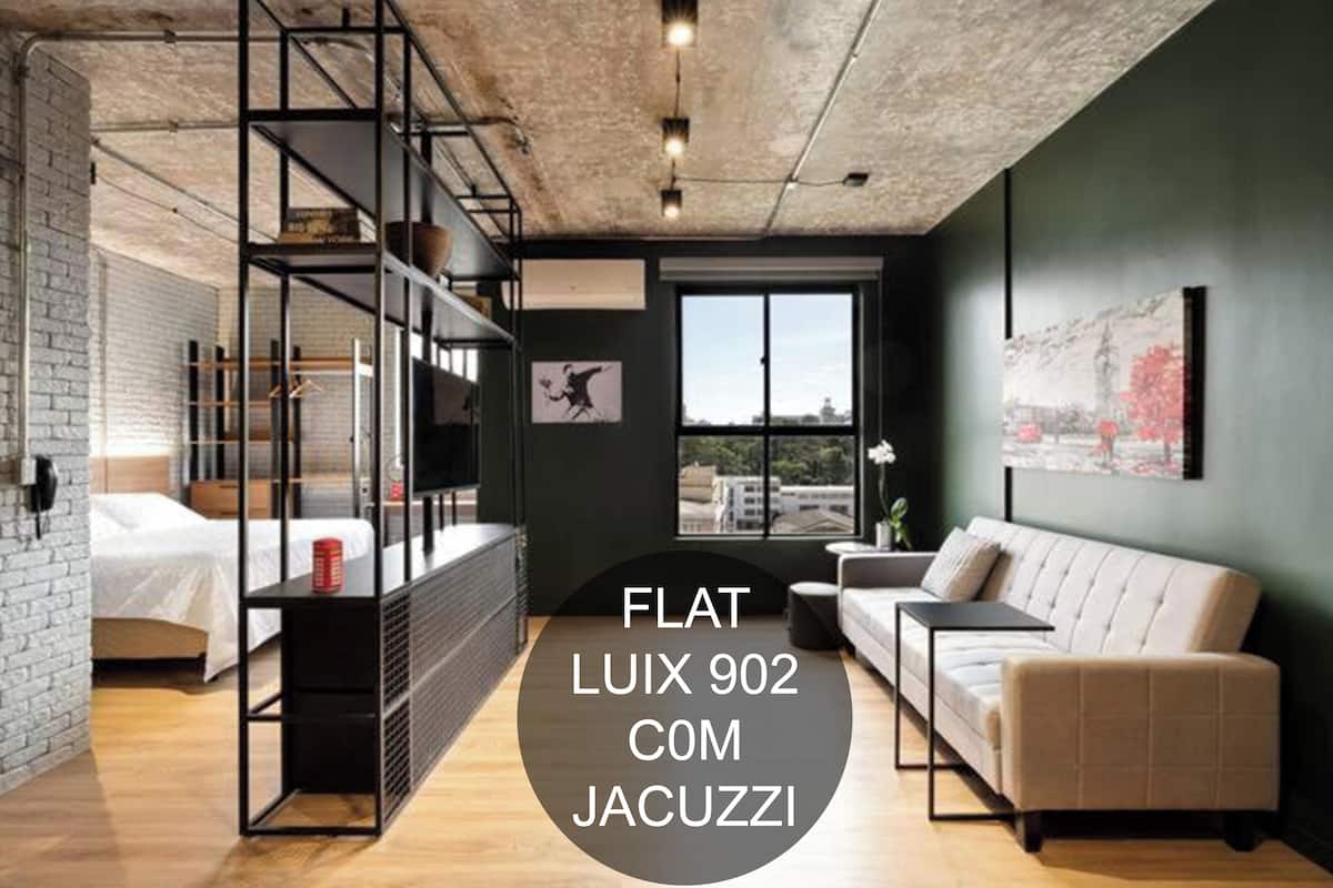 Apartamento, banheira de hidromassagem, vista para a cidade | Cozinha privada | Geladeira grande, micro-ondas, fogão, cooktop