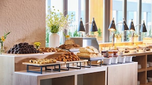 A buffet with various food items and a coffee station. - HOTEL HLB (Busan)