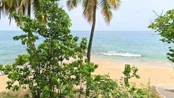 On the beach, sun loungers, beach towels