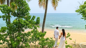 On the beach, sun loungers, beach towels