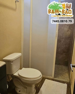 Shower, towels, soap, toilet paper