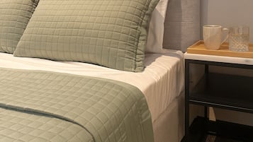 Desk, laptop workspace, blackout curtains, iron/ironing board