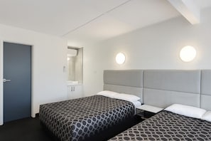 Desk, laptop workspace, blackout curtains, iron/ironing board