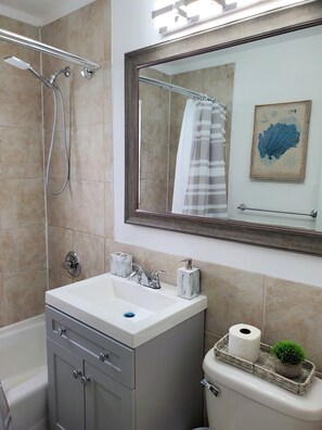 Hair dryer, towels, soap, toilet paper