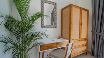 Deluxe Townhome, Pool View | In-room safe, desk, laptop workspace, iron/ironing board