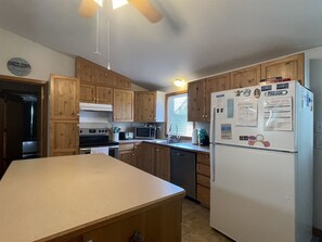 Fridge, microwave, stovetop, dishwasher - Chasing Sunsets Dog-friendly home w/deck and ocean view (HATTERAS)