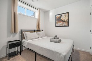 2 bedrooms, desk, iron/ironing board, travel crib