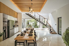 Deluxe Villa, Patio, Pool View | Dining room