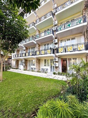 Deluxe Triple Room, Patio, Garden View | Terrace/patio