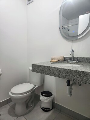 Shower, towels, soap, toilet paper