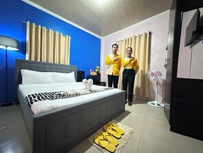 Standard Triple Room | Desk, blackout drapes, iron/ironing board, free WiFi