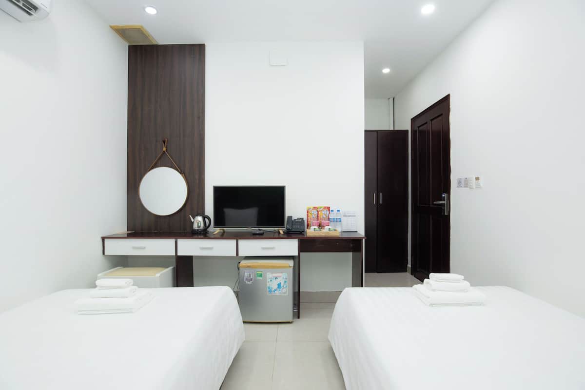 Quarto duplo | Frigobar, escrivaninha, Wi-Fi de cortesia, roupa de cama