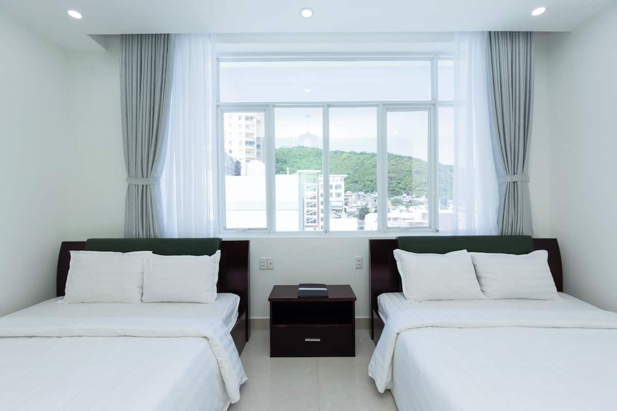Quarto família, vista para a cidade | Vista para a cidade