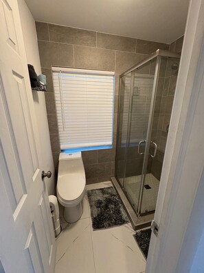 Hair dryer, towels, soap, toilet paper