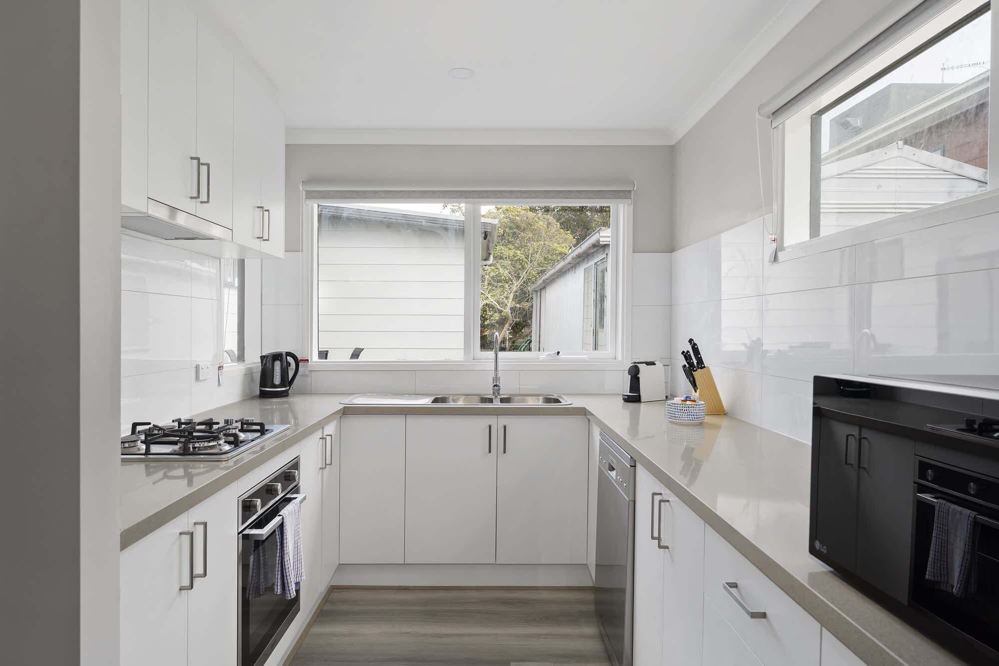 Coffee/tea maker, fridge, microwave, oven