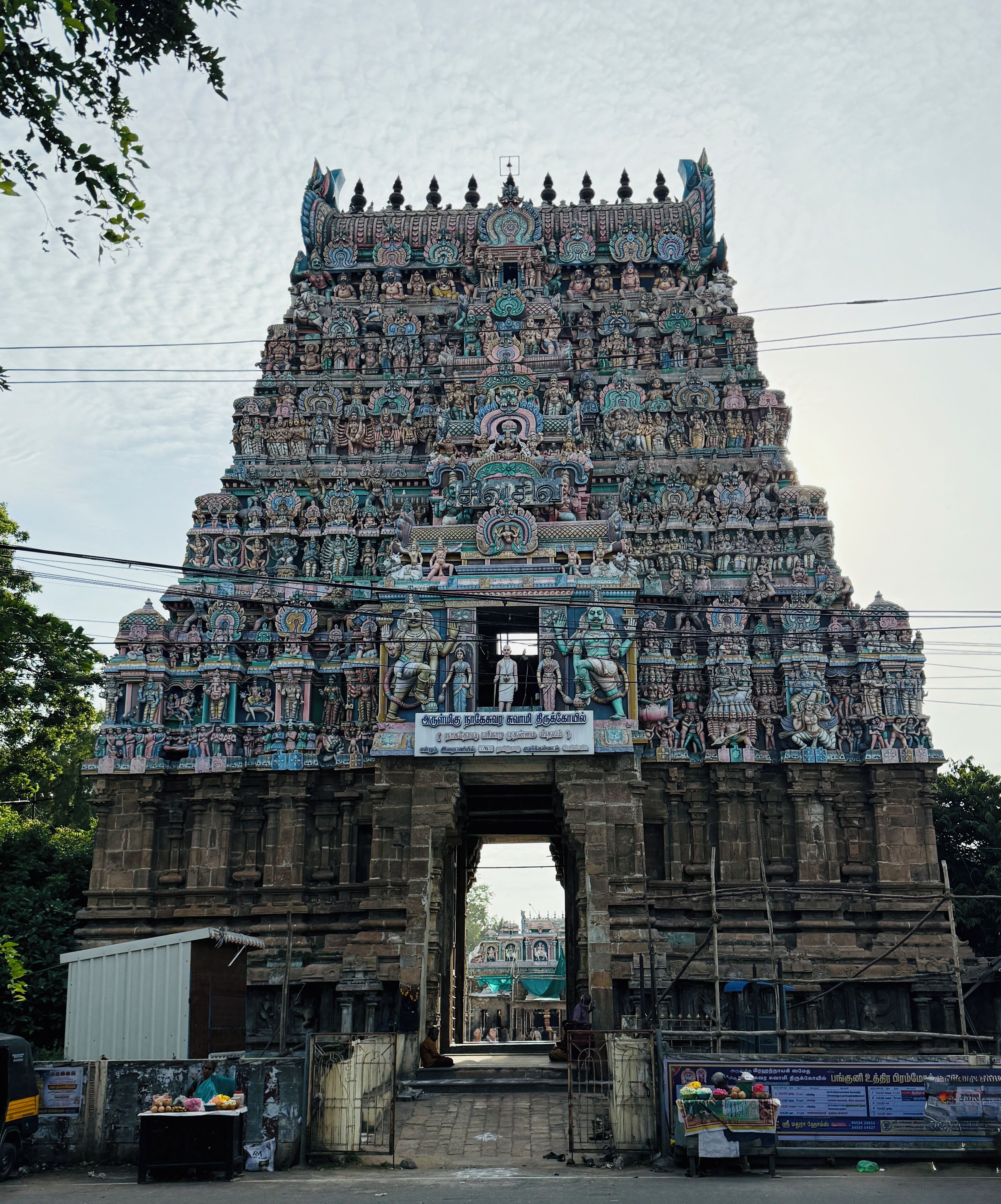A temple entrance with intricate carvings and statues.