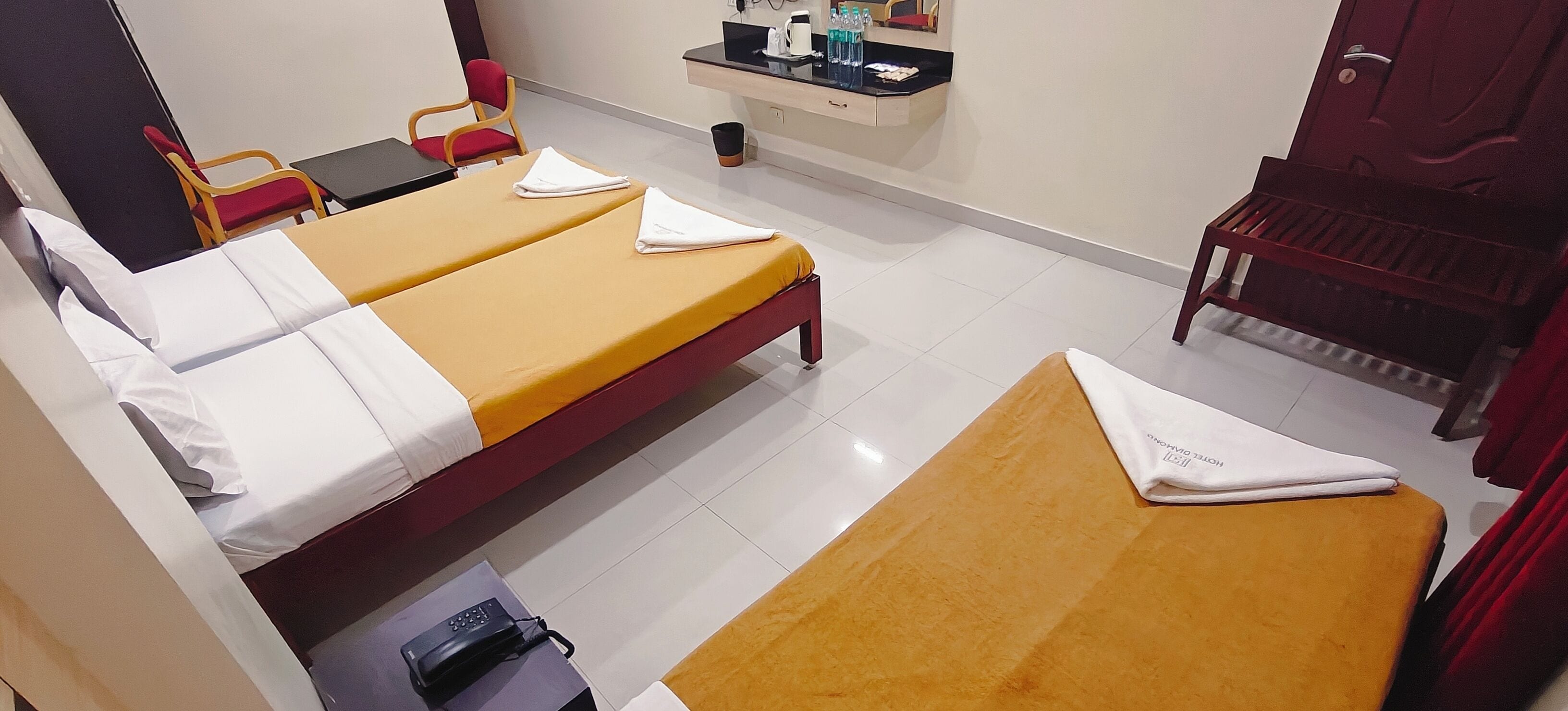 Deluxe Triple Room, City View | Down duvets, individually furnished, desk, laptop workspace