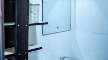 Shower, towels, soap, toilet paper