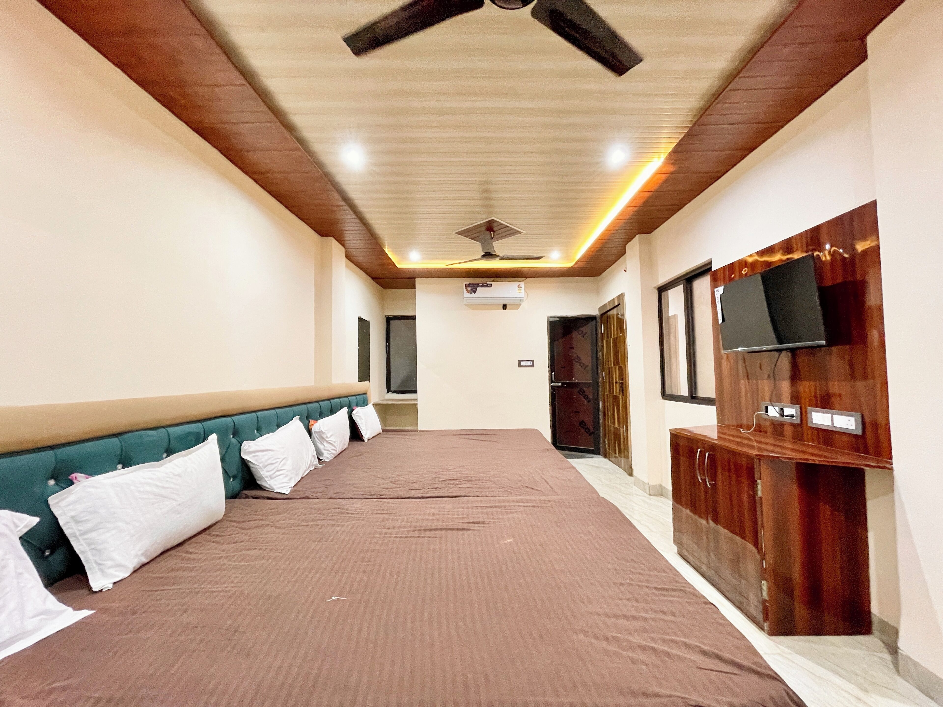 Premium bedding, desk, laptop workspace, soundproofing