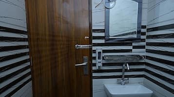 Shower, rainfall showerhead, towels, soap
