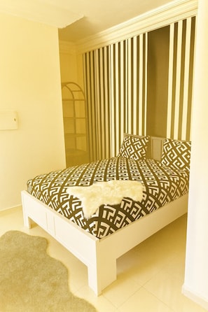 1 habitación, acceso a internet y ropa de cama