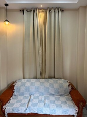 Habitación económica, vista a la ciudad | Wifi gratis y ropa de cama 