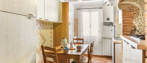 Fridge, toaster, cookware/dishes/utensils