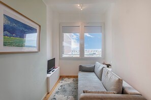 Apartment, 1 Queen Bed with Sofa bed, Partial Sea View | Living area