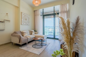 Deluxe Apartment, 1 Bedroom, Balcony, City View | Living area