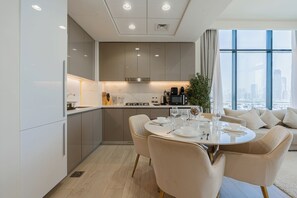 Deluxe Apartment, Balcony, City View | Private kitchen | Espresso maker, electric kettle