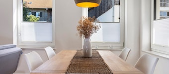Appartement Götz, accessible et convivial avec coin salon devant la maison