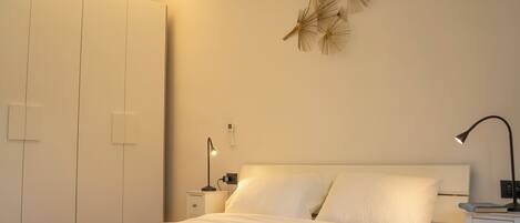 Penthouse Deluxe, vista a la ciudad | Tabla de planchar con plancha, cunas, wifi gratis y ropa de cama