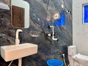 Shower, towels, soap, shampoo