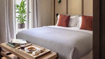 Suite, Balcony | Minibar, in-room safe, desk, laptop workspace