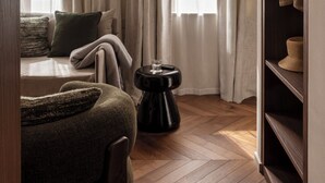 A room with a bed, a side table, a wardrobe, and a window with curtains. - Naman Hotellerie - Condotti (Rome)