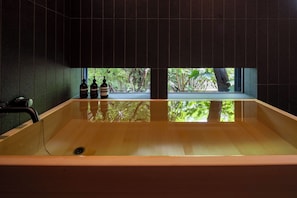 Luxury Double Room, Non Smoking, Garden View | Bathroom | Combined shower/tub, hair dryer, towels, shampoo