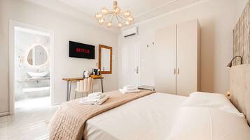 Frette Italian sheets, premium bedding, down comforters
