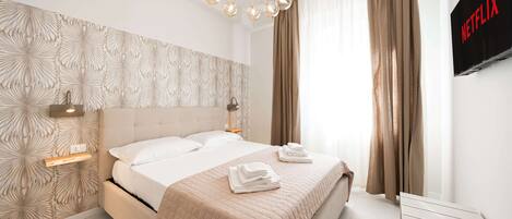 Frette Italian sheets, premium bedding, down duvets, memory-foam beds